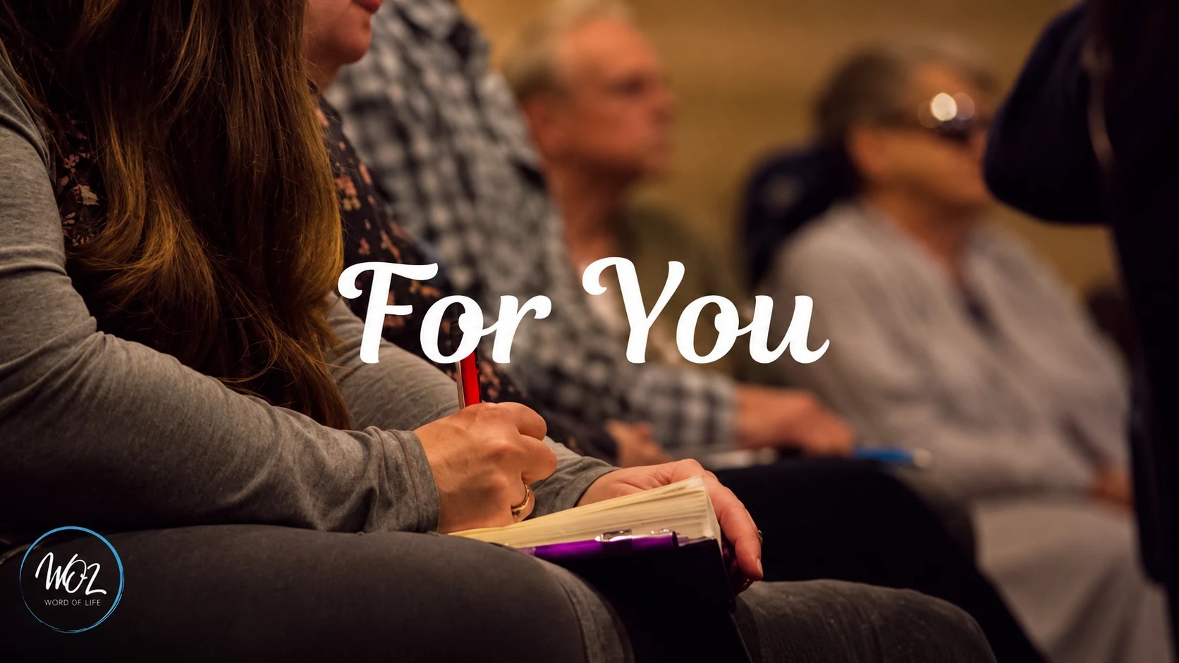 For you: a woman taking notes in the congregation